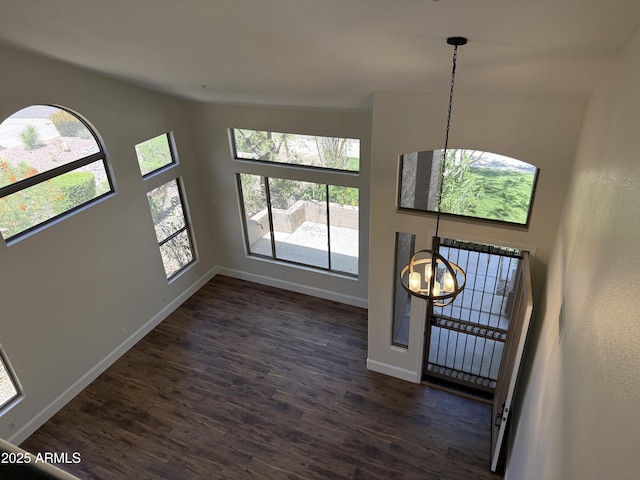 33220 N 60th Way, Scottsdale, AZ 85266 - foyer entrance with a chandelier, plenty of natural light, dark wood-style floors, and lofted ceiling