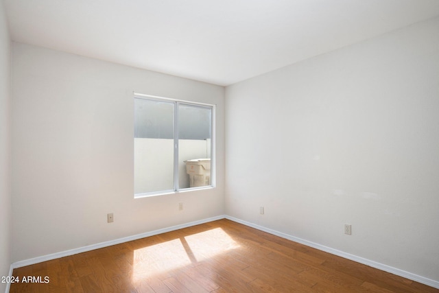 empty room featuring hardwood / wood-style floors