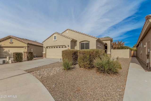 mediterranean / spanish-style home featuring a garage