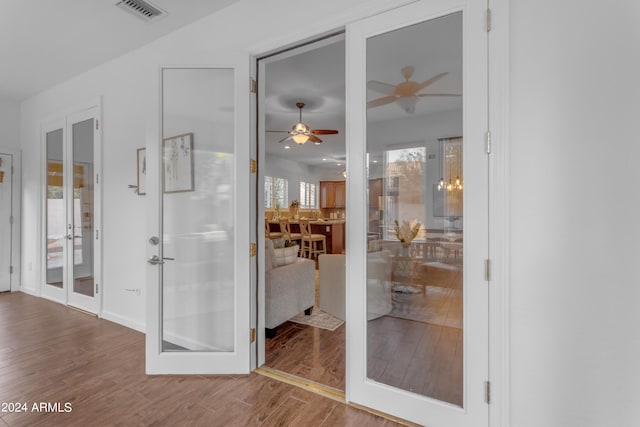 interior space featuring wood-type flooring and plenty of natural light