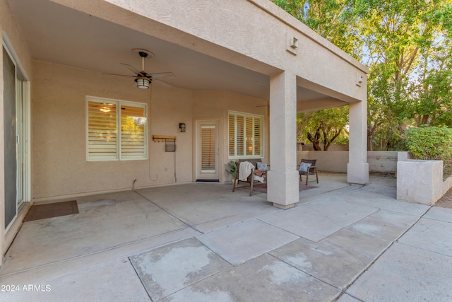 view of patio / terrace featuring ceiling fan