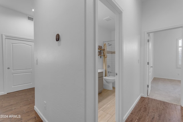 hallway featuring light hardwood / wood-style floors