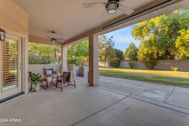 view of patio / terrace featuring ceiling fan