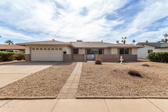 ranch-style home featuring a garage