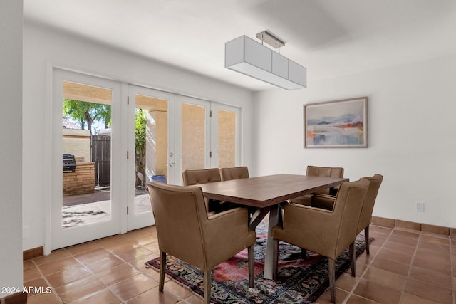 tiled dining room with french doors