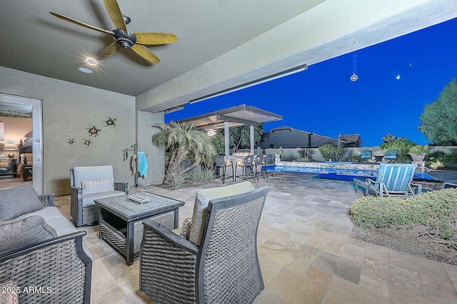 view of patio featuring an outdoor hangout area, ceiling fan, and an outdoor pool