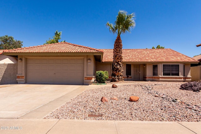 5354 E Ellis St, Mesa, AZ 85205 - ranch-style home with stucco siding, concrete driveway, and an attached garage
