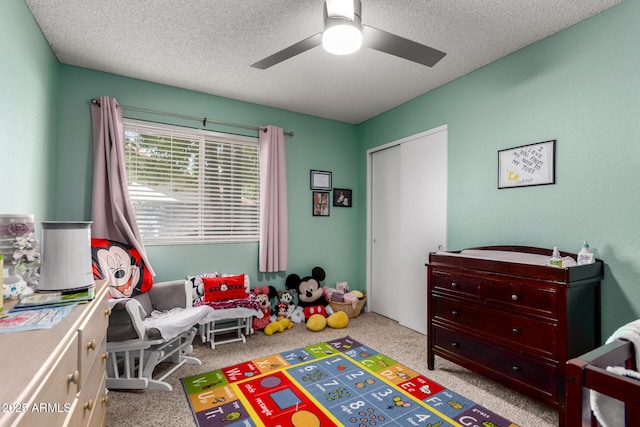 5354 E Ellis St, Mesa, AZ 85205 - rec room with a ceiling fan, carpet floors, and a textured ceiling