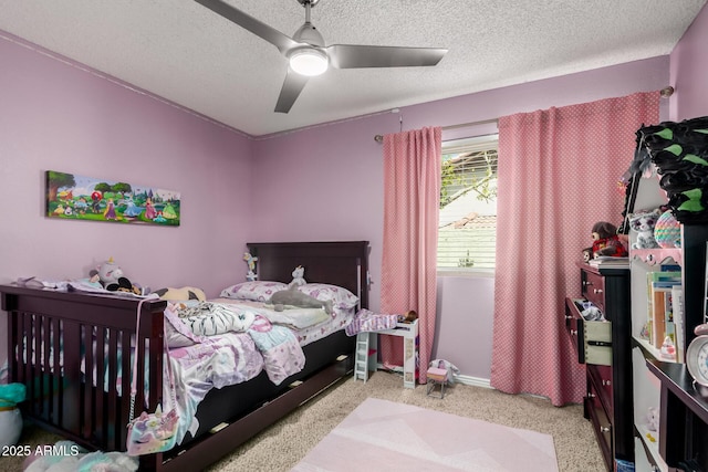 5354 E Ellis St, Mesa, AZ 85205 - bedroom with ceiling fan and a textured ceiling