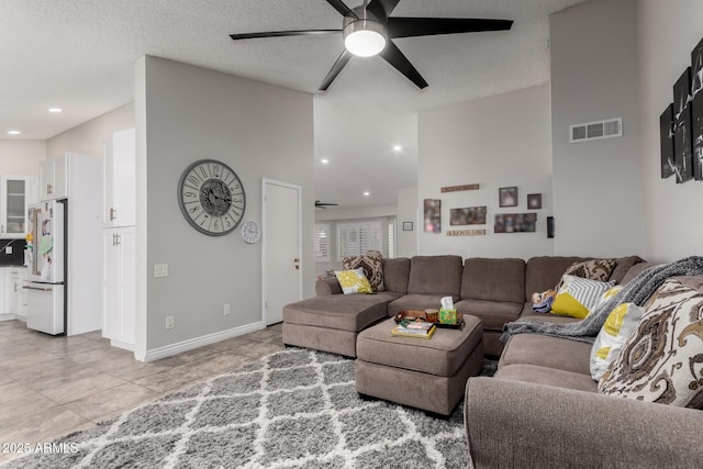 5354 E Ellis St, Mesa, AZ 85205 - living area with a ceiling fan, light tile patterned floors, recessed lighting, and a textured ceiling