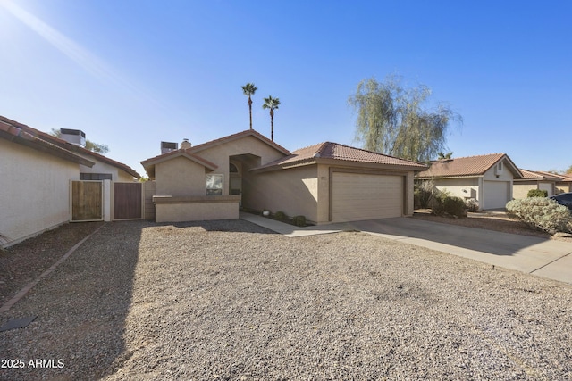 view of front of property featuring a garage and central air condition unit