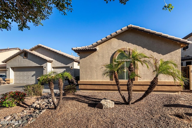 view of home's exterior with a garage