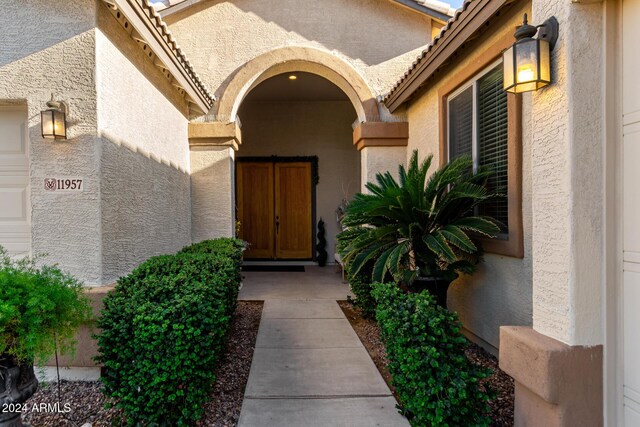 entrance to property with a garage