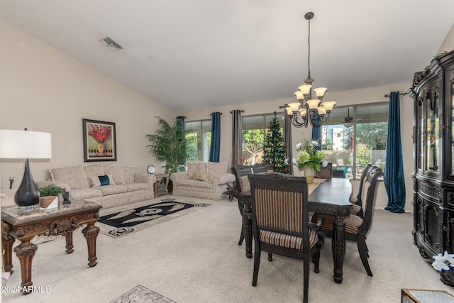 dining area featuring light colored carpet, lofted ceiling, and a notable chandelier