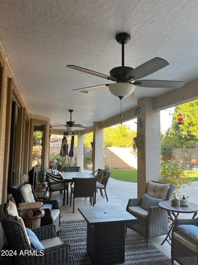 view of patio / terrace with ceiling fan and an outdoor hangout area