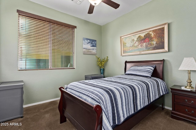 bedroom with dark carpet and ceiling fan