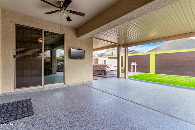 view of patio / terrace featuring ceiling fan