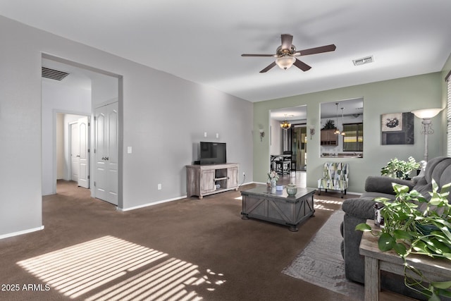 carpeted living room featuring ceiling fan