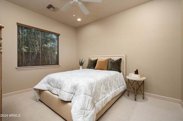 carpeted bedroom with ceiling fan