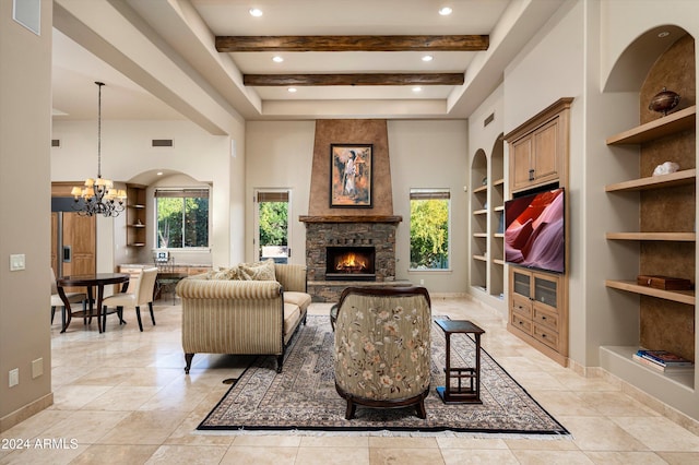 tiled living room featuring a high ceiling, an inviting chandelier, built in features, a fireplace, and beamed ceiling