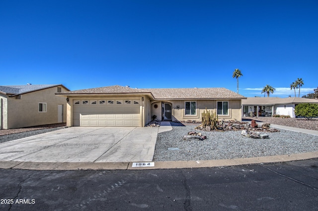 ranch-style house featuring a garage