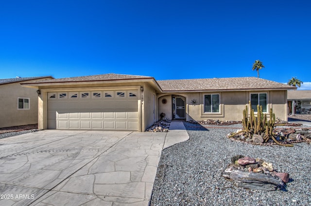 single story home with a garage