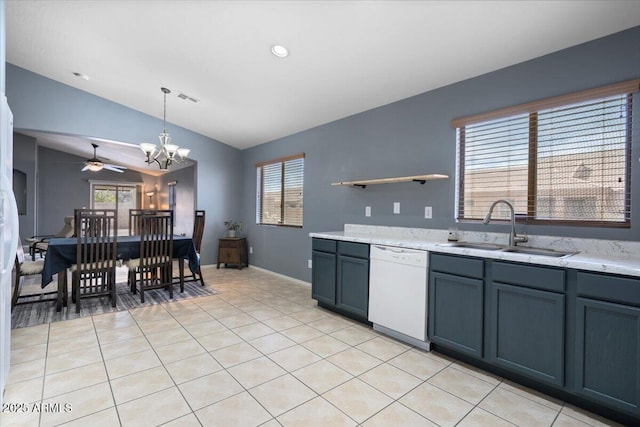 kitchen with white dishwasher, light tile patterned flooring, a sink, visible vents, and vaulted ceiling