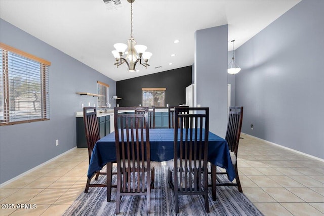 dining space with light tile patterned floors, visible vents, vaulted ceiling, and a notable chandelier