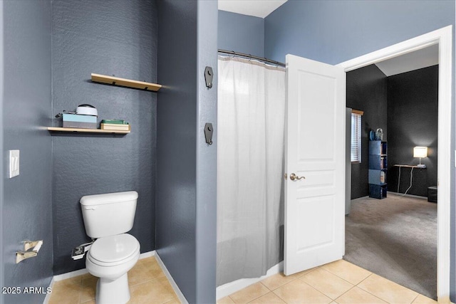 full bathroom with baseboards, tile patterned flooring, toilet, and a shower with curtain