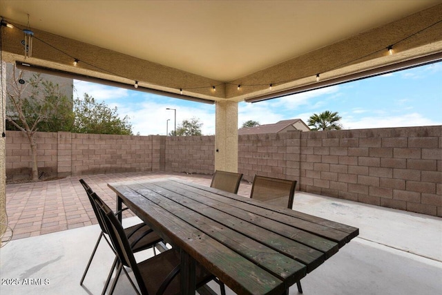 view of patio / terrace featuring a fenced backyard and outdoor dining space