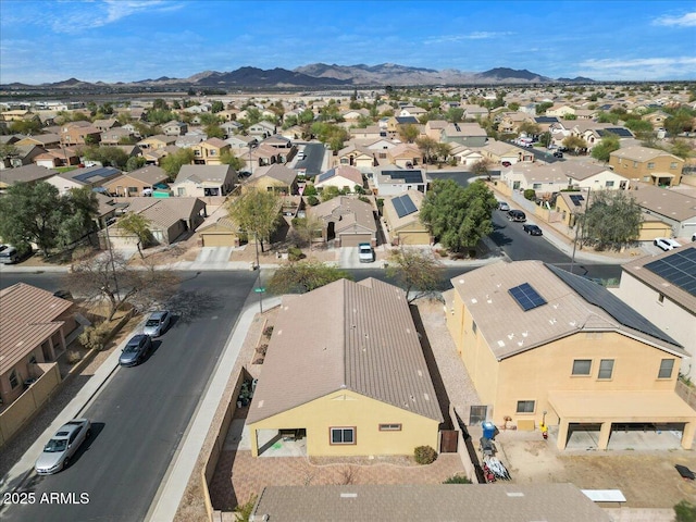 birds eye view of property with a residential view and a mountain view