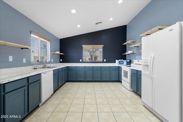 kitchen with light tile patterned floors, open shelves, visible vents, vaulted ceiling, and white appliances