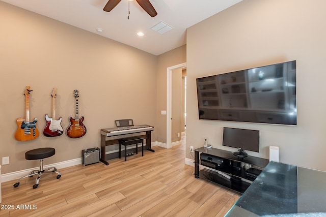 interior space featuring ceiling fan and light wood-type flooring