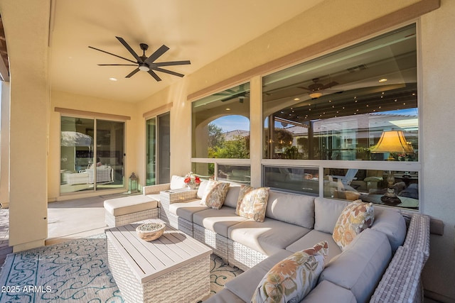 sunroom / solarium with an outdoor hangout area, a patio, and ceiling fan