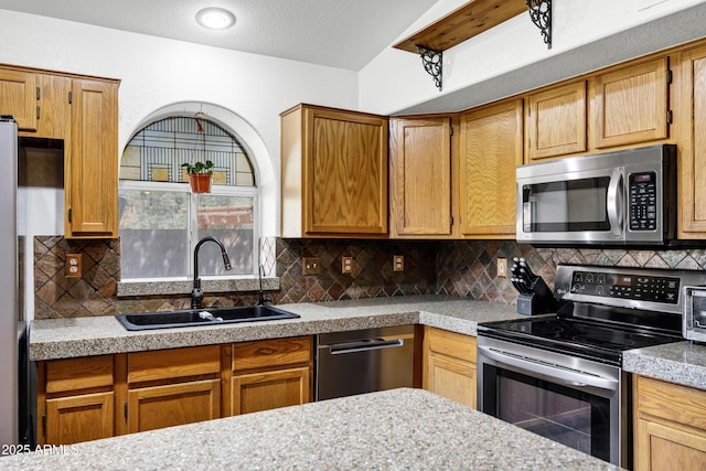 1245 W Cindy St, Chandler, AZ 85224 - kitchen with appliances with stainless steel finishes, a sink, backsplash, and light countertops