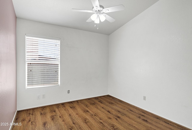 1245 W Cindy St, Chandler, AZ 85224 - empty room with wood finished floors, ceiling fan, lofted ceiling, and baseboards