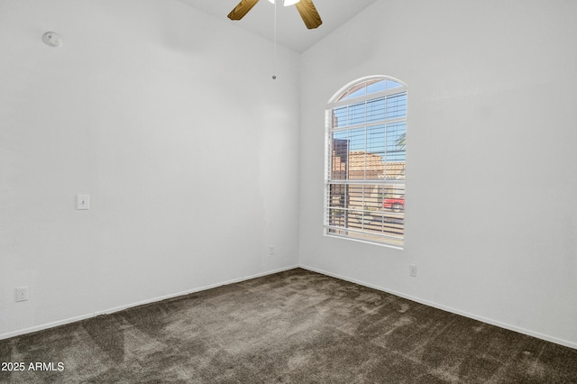 1245 W Cindy St, Chandler, AZ 85224 - spare room with dark colored carpet, a ceiling fan, vaulted ceiling, baseboards, and a smoke detector