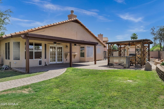 1245 W Cindy St, Chandler, AZ 85224 - back of house featuring ceiling fan, a chimney, stucco siding, a patio, and french doors
