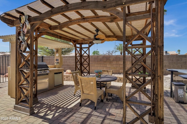 1245 W Cindy St, Chandler, AZ 85224 - fenced backyard with outdoor dining space, a patio, and a ceiling fan