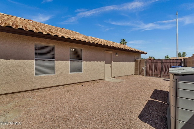1245 W Cindy St, Chandler, AZ 85224 - view of side of home featuring stucco siding and a tile roof