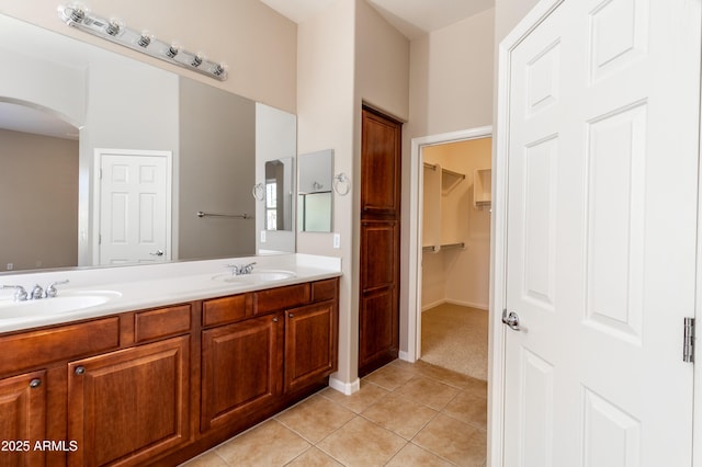 4241 E Andre Ave, Gilbert, AZ 85298 - bathroom with double vanity, tile patterned floors, and a spacious closet