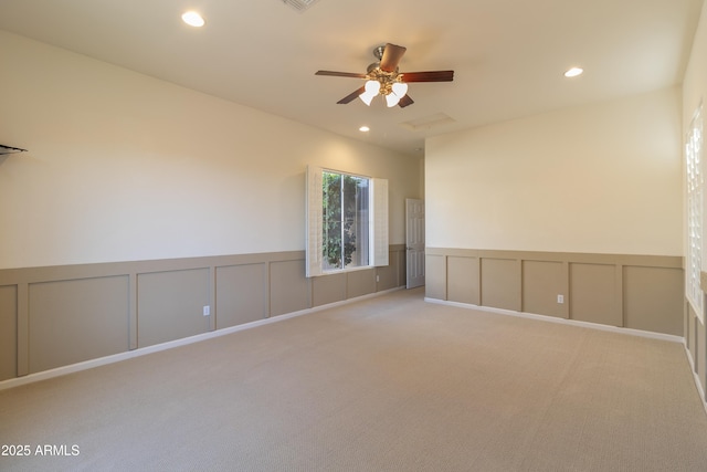 4241 E Andre Ave, Gilbert, AZ 85298 - carpeted spare room with a decorative wall, ceiling fan, recessed lighting, and wainscoting