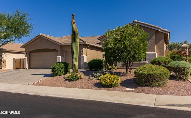 4241 E Andre Ave, Gilbert, AZ 85298 - view of front of home featuring stucco siding, a garage, concrete driveway, and a tiled roof