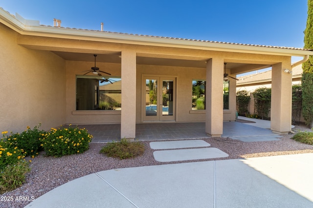 4241 E Andre Ave, Gilbert, AZ 85298 - entrance to property with ceiling fan, stucco siding, and french doors