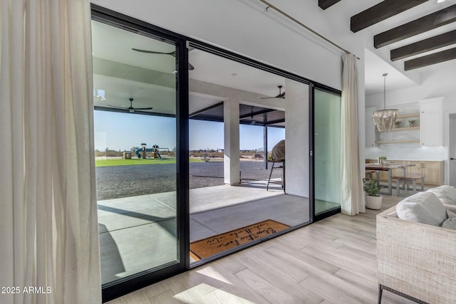 35150 N Bell Rd, Queen Creek, AZ 85144 - doorway to outside featuring beamed ceiling and wood finished floors