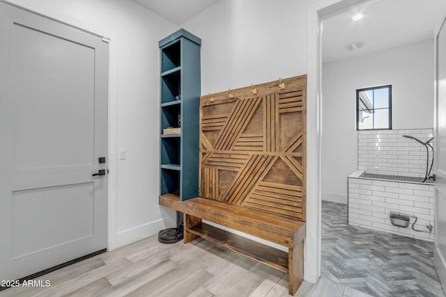 35150 N Bell Rd, Queen Creek, AZ 85144 - mudroom featuring parquet floors, baseboards, and visible vents