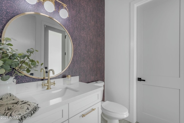 35150 N Bell Rd, Queen Creek, AZ 85144 - bathroom with toilet, vanity, and wallpapered walls