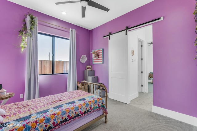35150 N Bell Rd, Queen Creek, AZ 85144 - carpeted bedroom with baseboards, recessed lighting, a ceiling fan, and a barn door