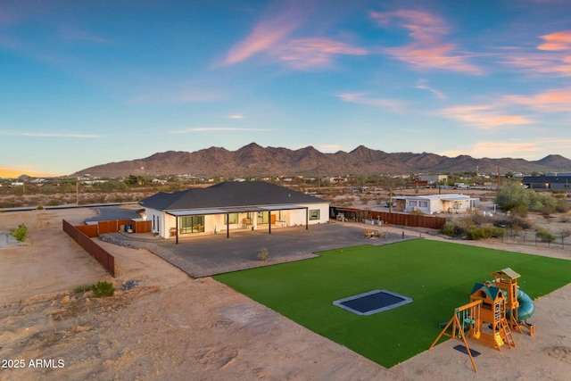35150 N Bell Rd, Queen Creek, AZ 85144 - rear view of property with a patio area, a fenced backyard, and a mountain view