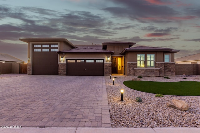 prairie-style home with a garage